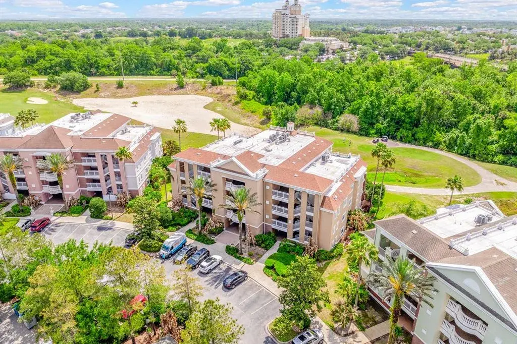 Step into elevated RESORT STYLE LIVING in the GUARD GATED Villas at Reunion Square – where GOLF COURSE VIEWS, modern upgrades, and a truly MOVE-IN READY condition come together in one exceptional second floor unit!