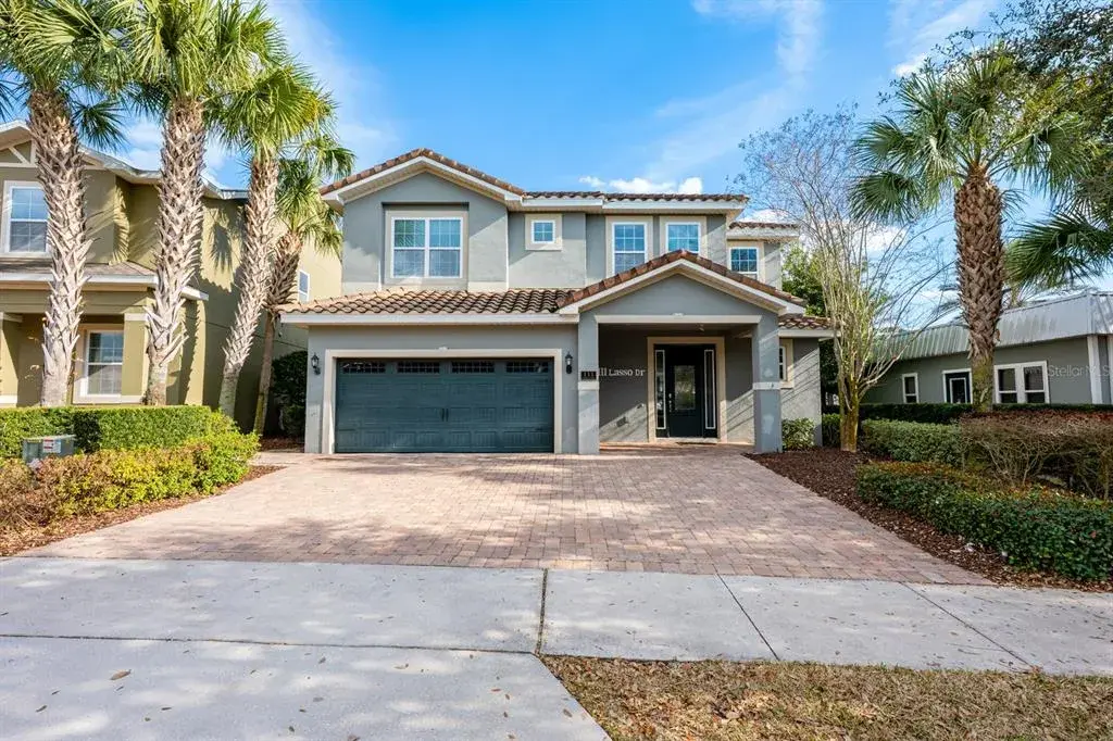 Welcome to an EXTRAORDINARY LUXURY RETREAT in the distinguished Reunion West community where elegance, scale, and unforgettable experiences come together in one spectacular 4,500-SQUARE-FOOT vacation estate.