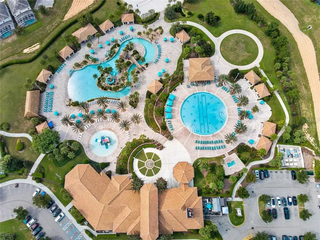 Resort-style living at ChampionsGate! Enjoy incredible community amenities including resort pools, a lazy river, water slides, splash areas, clubhouse, fitness center, dining, sports courts and more—all designed to make every day feel like a vacation.