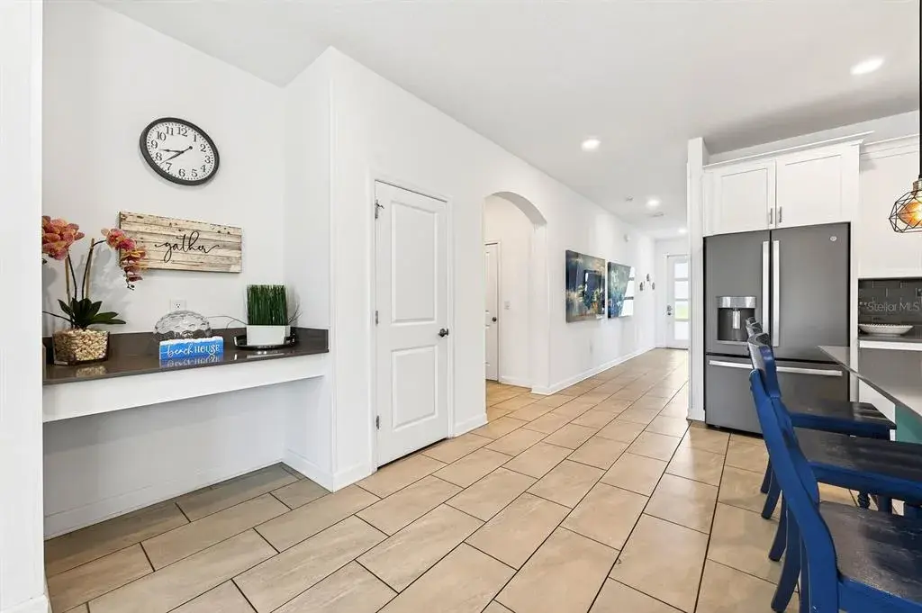The main floor was designed for effortless gathering, with the Kitchen, Dining Area and Living Room flowing together in a bright OPEN CONCEPT layout.