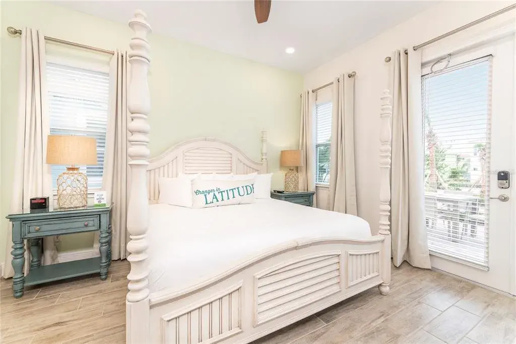 Spacious primary bedroom with natural light in Margaritaville Resort Orlando near Disney