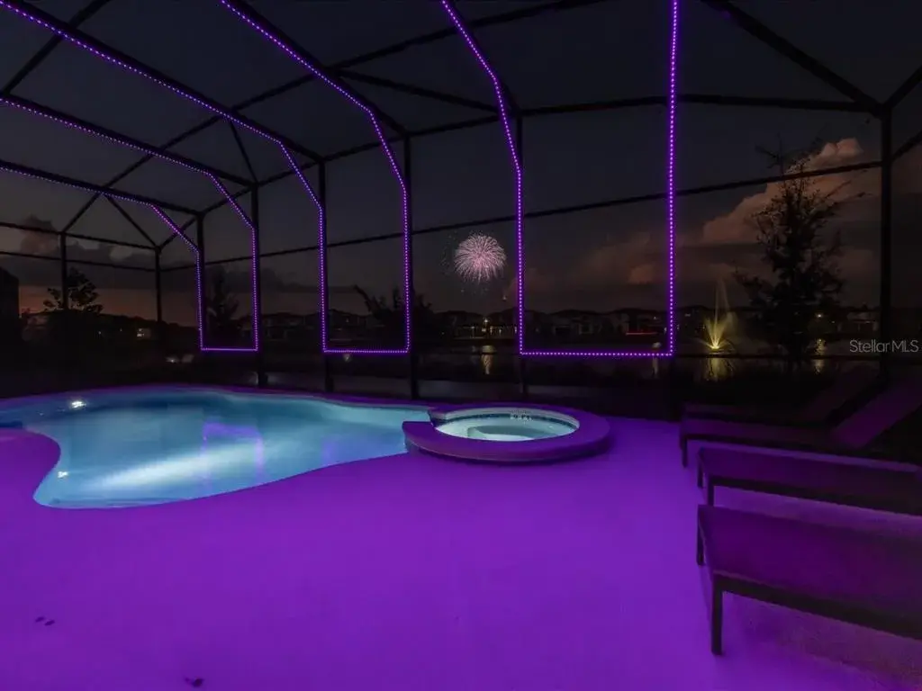 Pool + SPA with LED lights - SeaWorld fireworks and the pond fountain view to