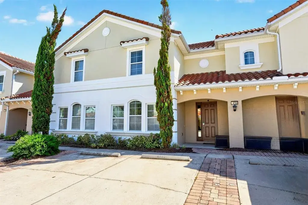 RESORT-STYLE LIVING, PRIVATE POOL AND SHORT-TERM RENTAL POTENTIAL come together in this beautifully maintained 4-bedroom, 3.5-bath townhome in the sought-after Solterra Resort of Davenport!