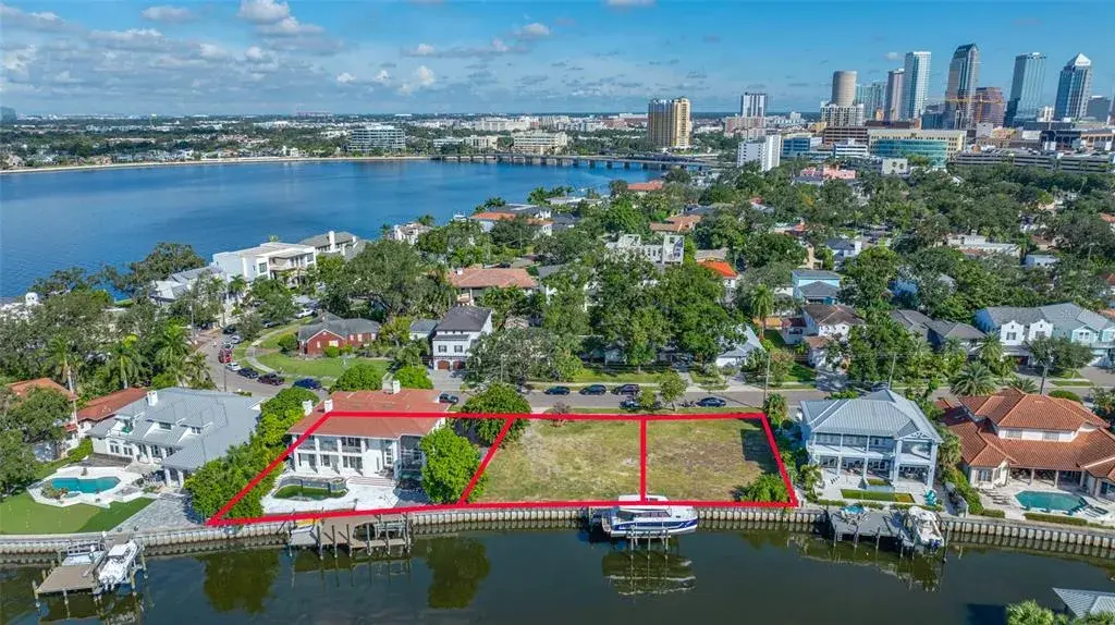 102 Adalia is the middle homesite. Great water and build for wonderful downtown skyline views. Best of both worlds!