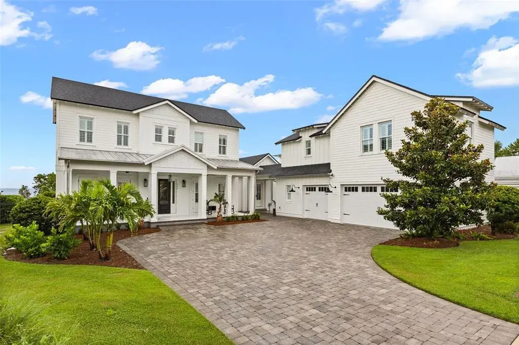 OAKLAND PARK | WINTER GARDEN907 Celadon Street — a 5,036-sq-ft residence with a 907-sq ft detached guest house /ADU above the garage.