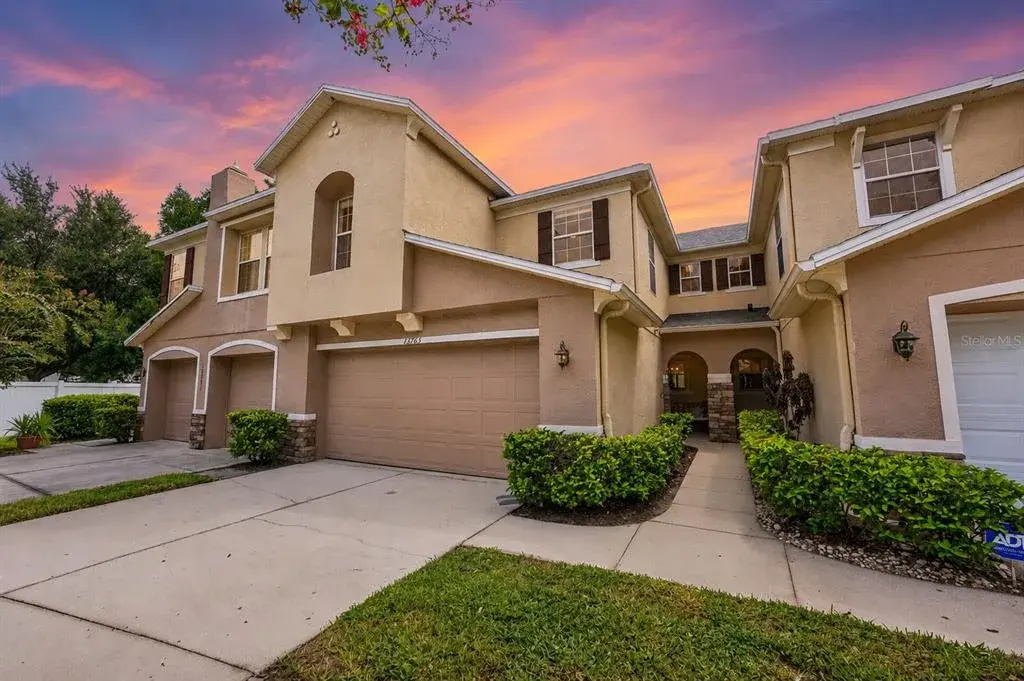 Welcome to this beautifully updated 3-bedroom, 2.5-bath townhome with a 2-CAR GARAGE in the GATED Orchard community of Winter Garden! Virtual Twilight.