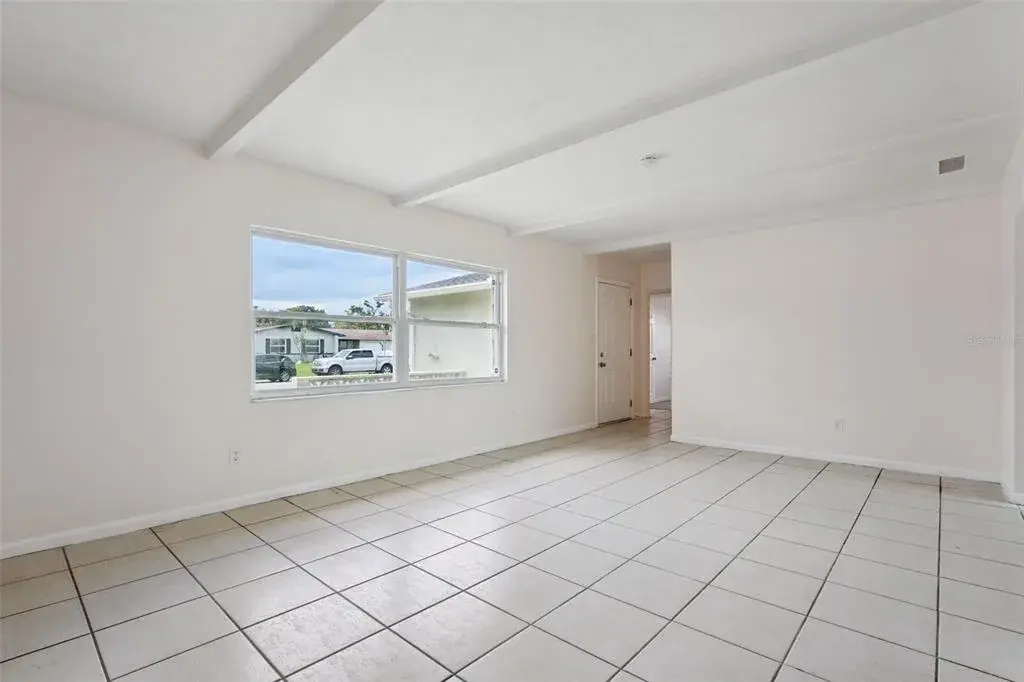 Light-filled Living Room with Tile Floors