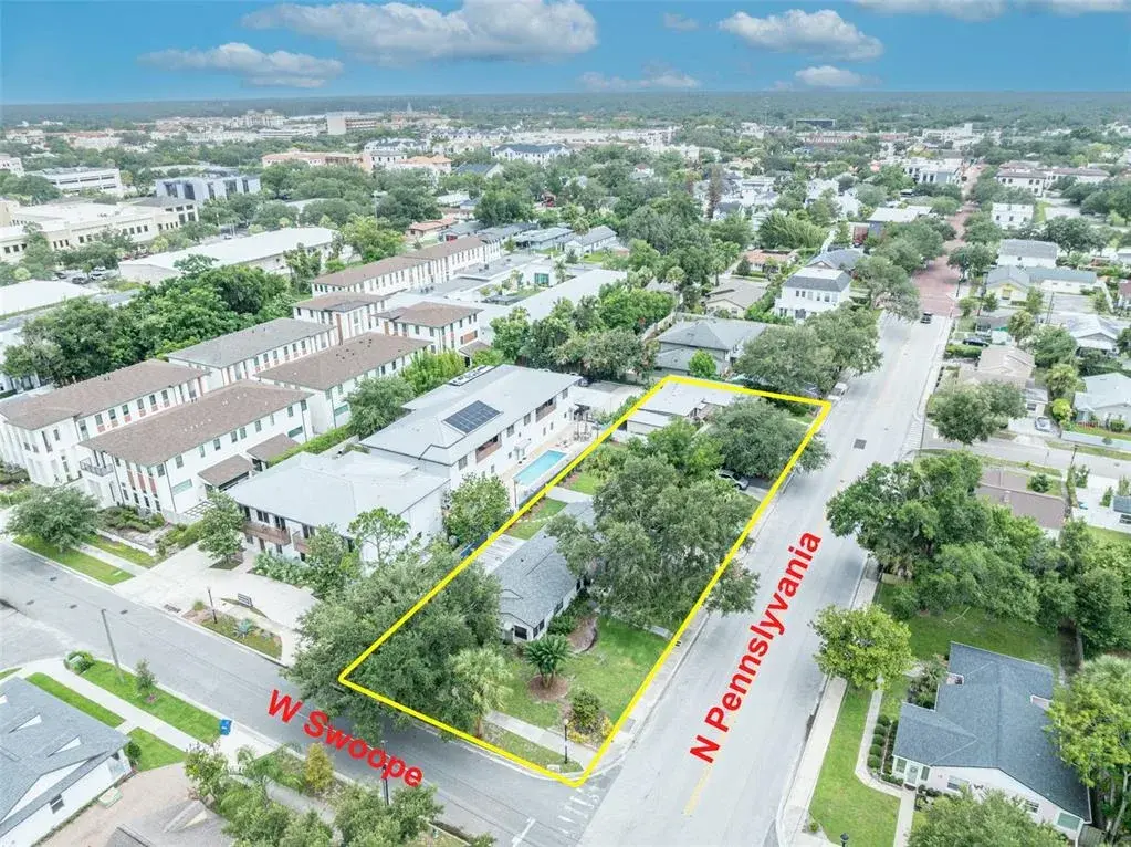 JUST UNDER HALF ACRE CORNER LOT