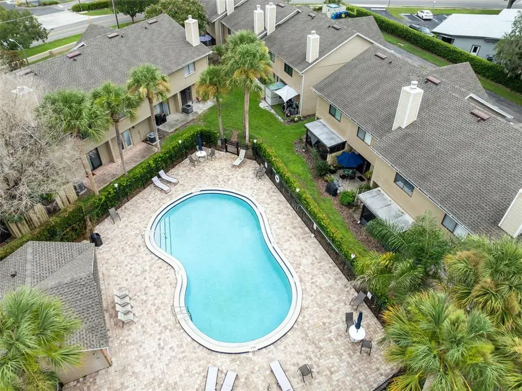Sandlewood Creek is a quiet, established community with a community pool and one assigned parking space. Maitland Community Park is located directly behind the community and connects to additional park space, offering convenient access to trails and outdoor recreation. Schools are nearby, and Park Avenue and Downtown Winter Park are approximately 10 minutes away, putting shopping, dining and entertainment within easy reach.