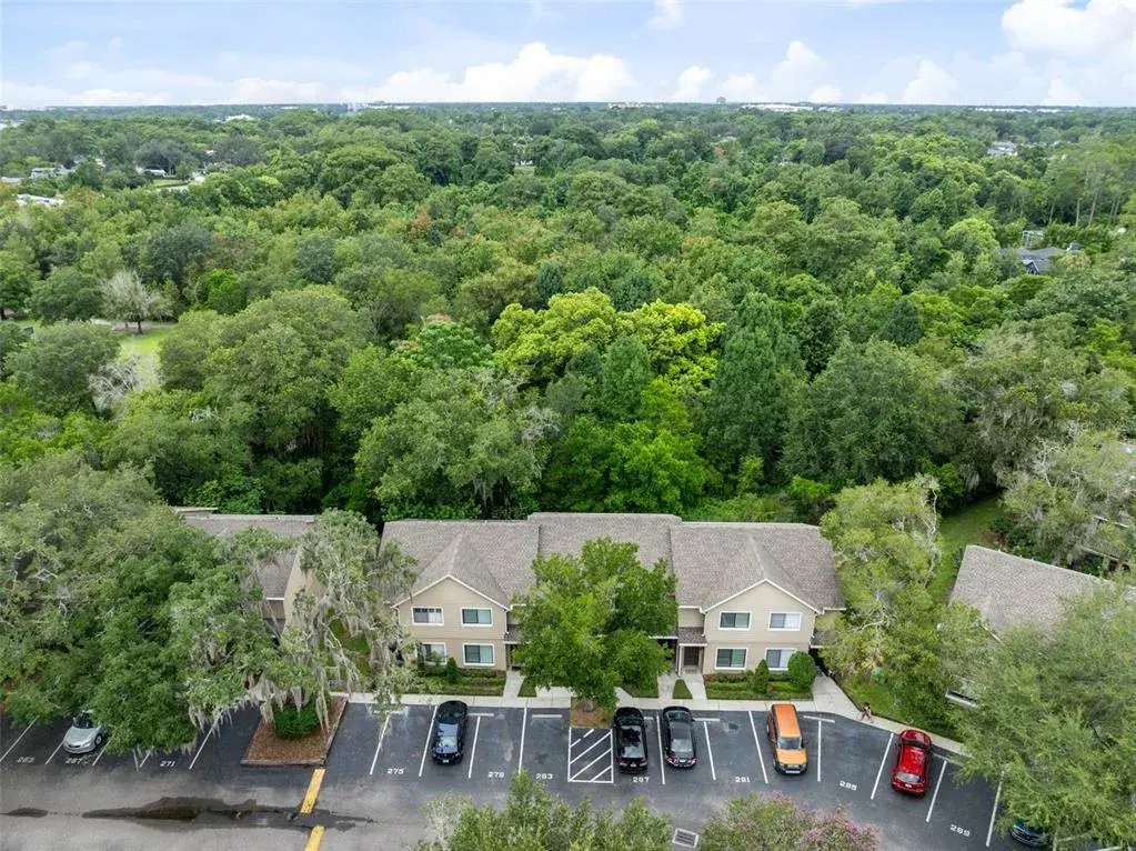 Sandlewood Creek is a quiet, established community with a community pool and one assigned parking space. Maitland Community Park is located directly behind the community and connects to additional park space, offering convenient access to trails and outdoor recreation. Schools are nearby, and Park Avenue and Downtown Winter Park are approximately 10 minutes away, putting shopping, dining and entertainment within easy reach.