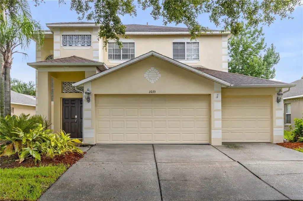 Double Doors, 3 car garage, 2 story