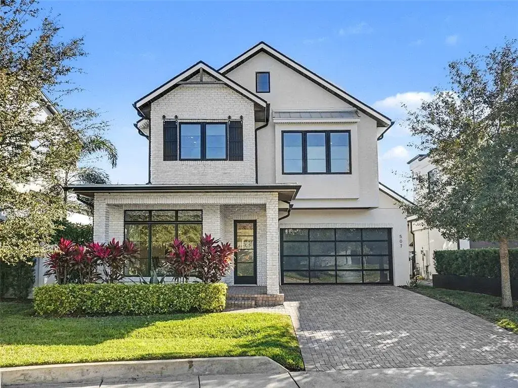 Front Exterior with pavered driveway