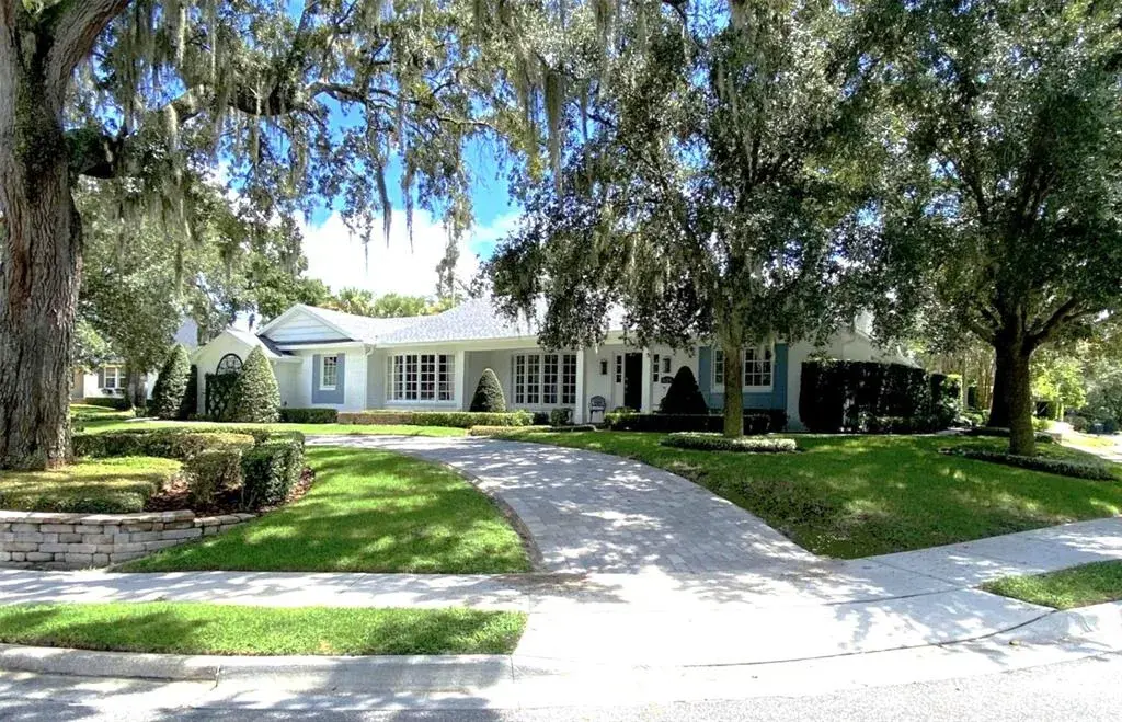 One story English Country style with tall ceilings and "resort" backyard!