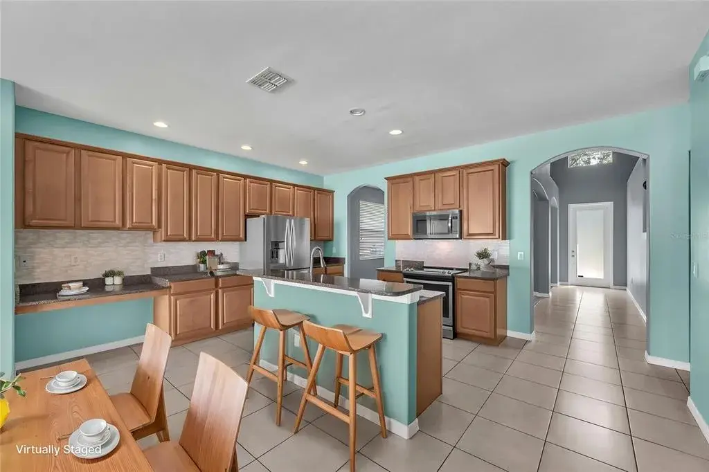42-inch maple cabinetry with plenty of granite work surface.