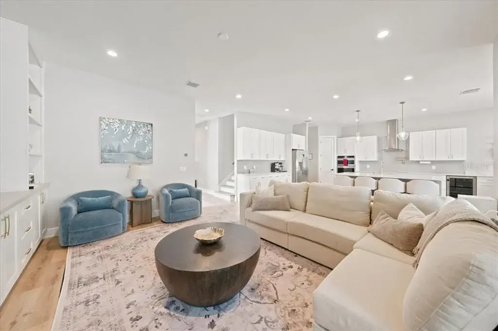 Seamless connection between the kitchen, dining, and main living areas makes entertaining effortless.