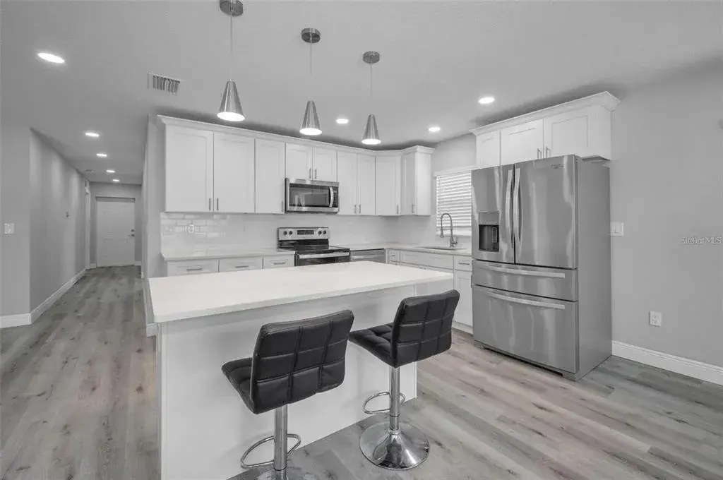 Kitchen – Island and Open Concept Layout