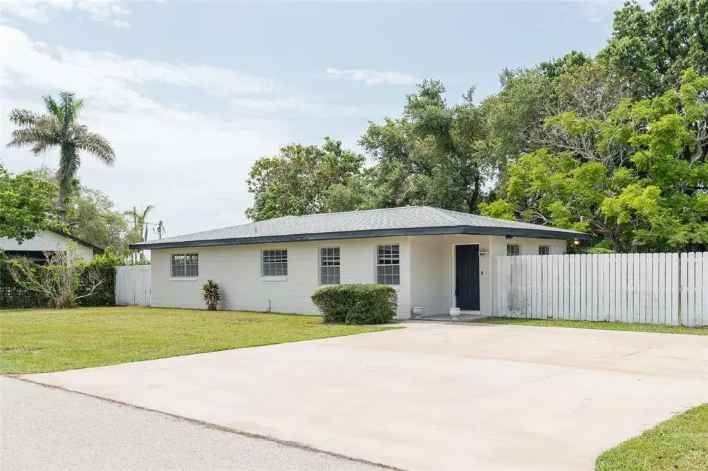 Classically styled block home and on a massive lot!