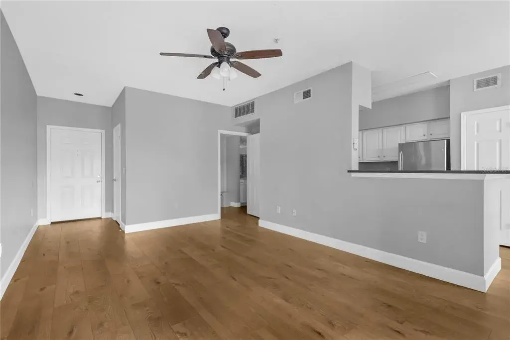 Living Room w/Wide Planked Vinyl Floors