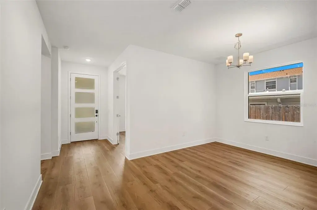 Front entry den and dining room area