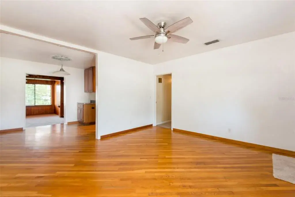 The living room flows into the dining room.