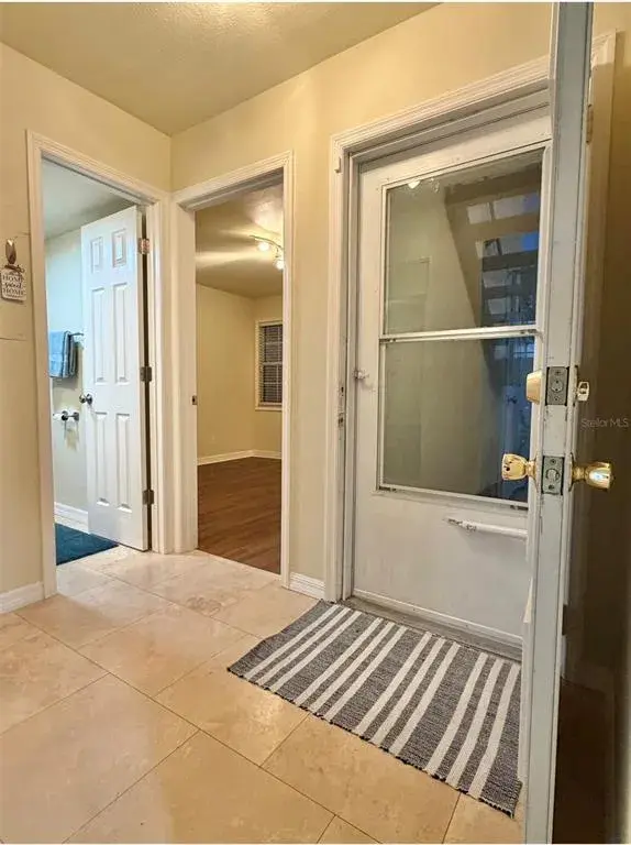 Just inside the entrance is a second bedroom and full bathroom.