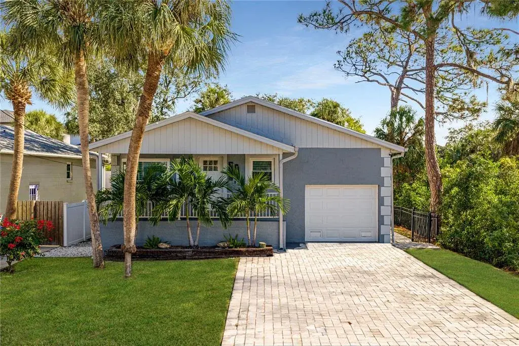Charming pool home with paved driveway