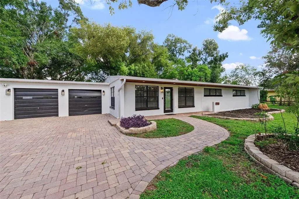 DEFINITELY A HOME TO BE PROUD OF IN A QUIET SETTING WITH A LARGE YARD AND OVERSIZED TWO CAR GARAGE.... ENJOY THE GOLF COURSE VIEW IN FRONT AND BACK OF THIS LOVELY HOME.
