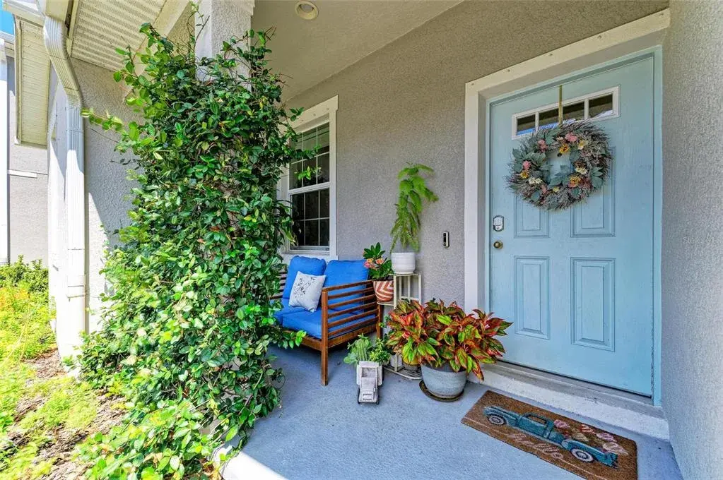 Covered front entrance and spacious porch