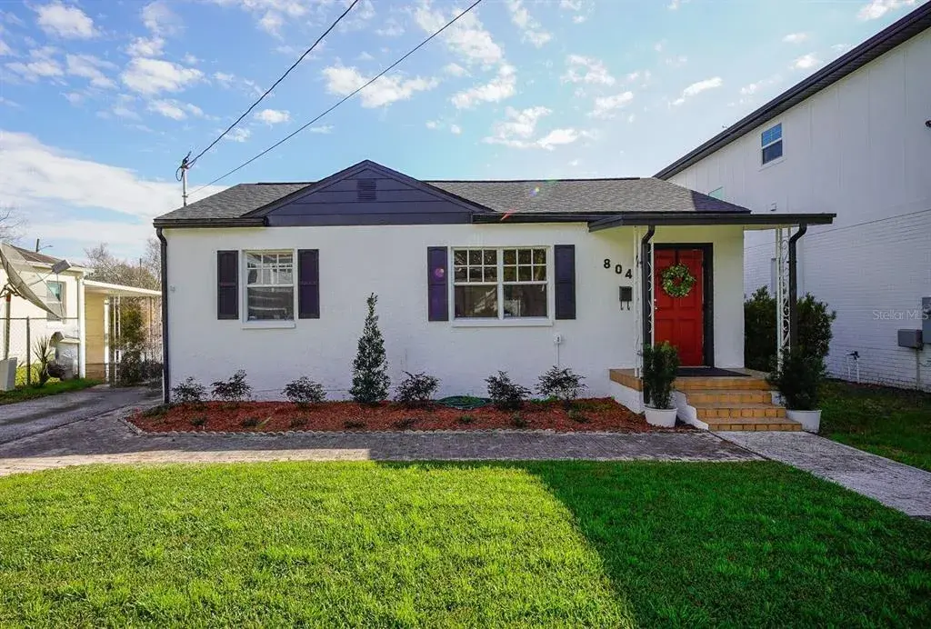 Charming front with red door