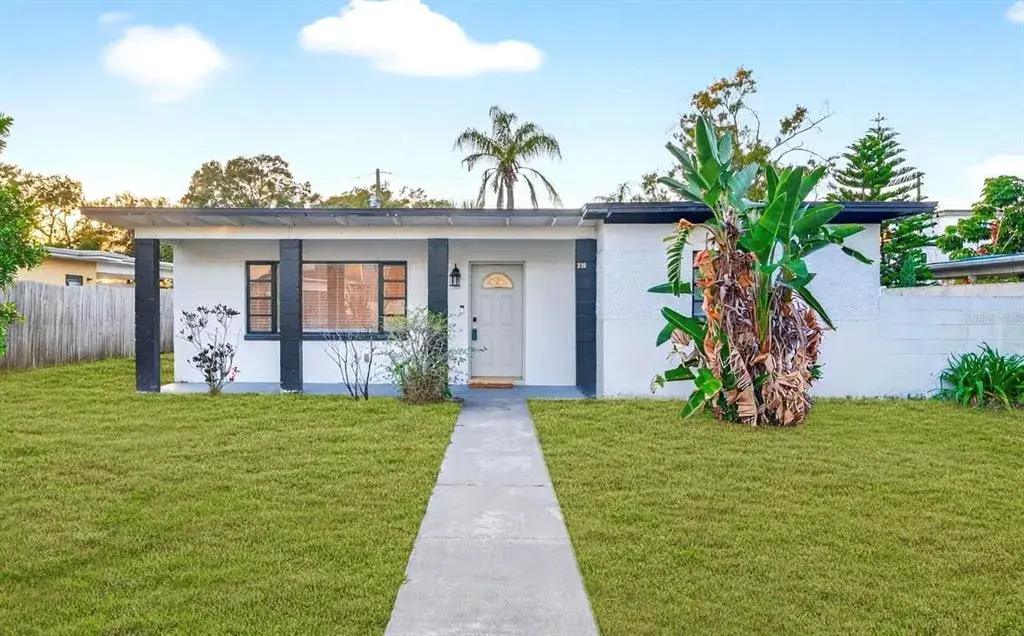 Front yard off N Glen Ave. Lawn shown has been digitally enhanced to illustrate potential landscaping
