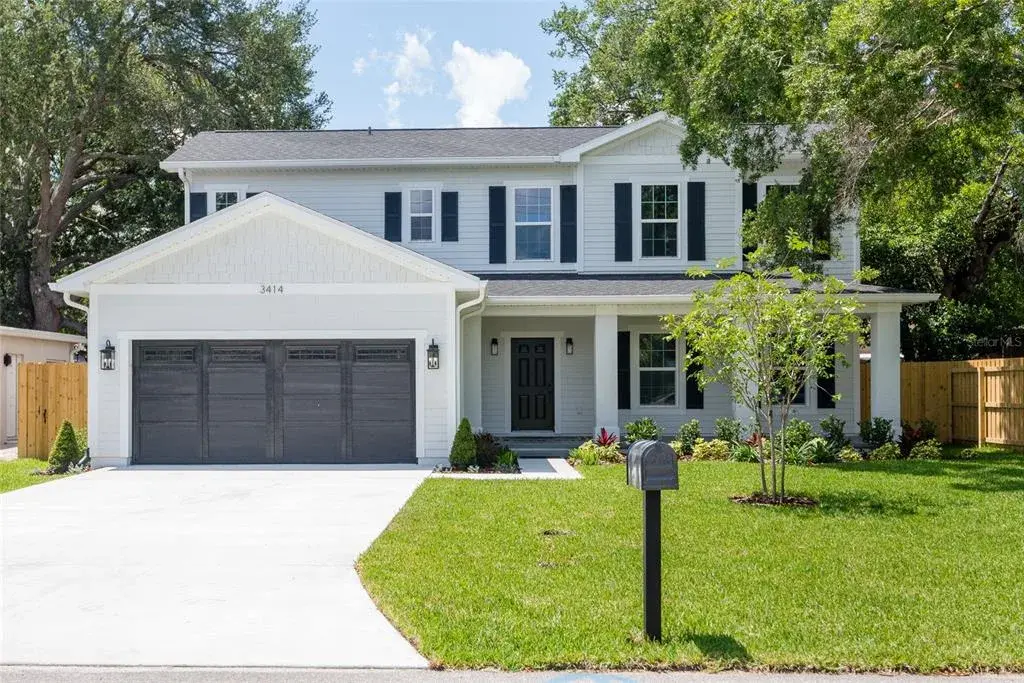 Welcome to 3414 W. Cherokee Ave! Large inviting front porch and pretty landscaping invite you right in.