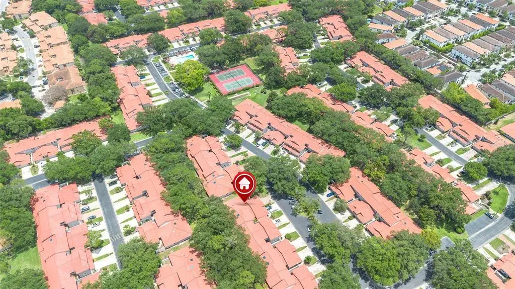 Conveniently located on the same street and just steps from the community amenities and the heated swimming pool