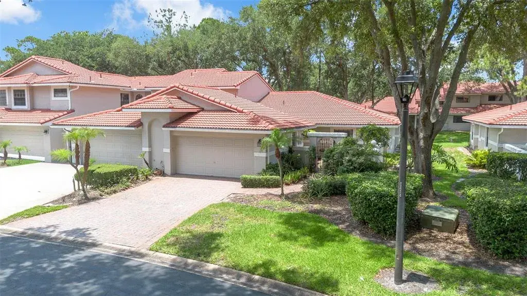 Highly sought after single story end unit 3 bedrooms 2 baths Capri floor plan in desirable gated Sandpointe in the heart of Dr. Phillips.