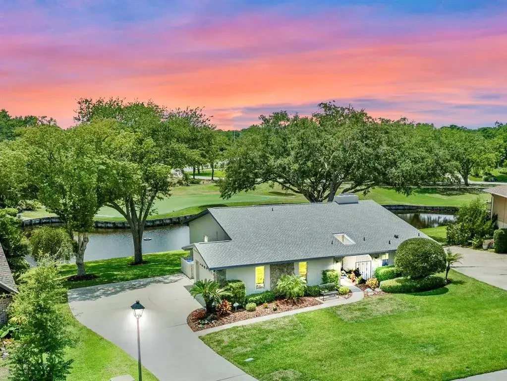 Stunning water and golf views on Orange Tree Country Club's signature hole.