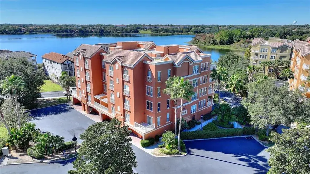 Condo building and view of Spring Lake