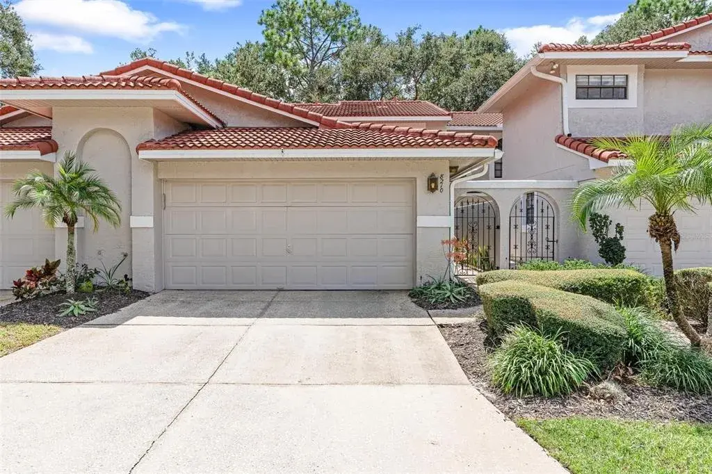 Welcome home to your move in ready Naples 3 bedrooms 2.5 baths Naples model in desirable and gated Sandpointe Townhomes in the heart of Dr. Phillips.