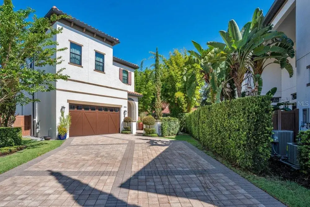 Front has extra long driveway to park 6 cars