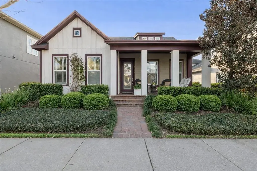WELCOME HOME! Truly one of a kind single story David Weekley home in Laureate Park Lake Nona with custom landscaping and plantation shutters throughout.