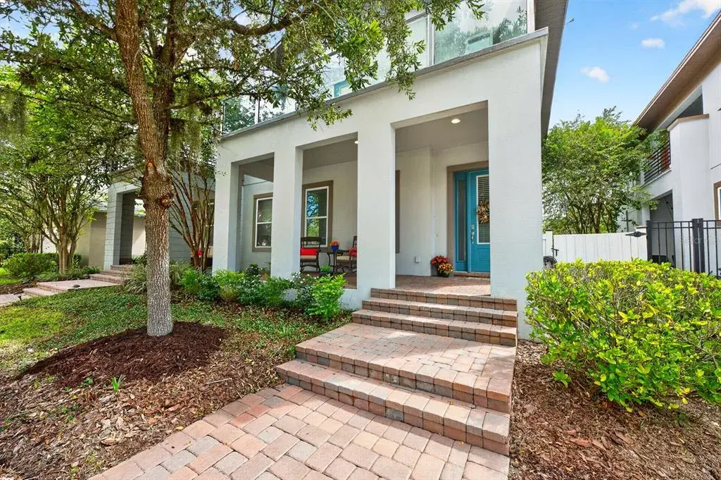 Low maintenance Lake Nona living with elevated style, flexible space and an unbeatable Laureate Park lifestyle! Virtually Staged.