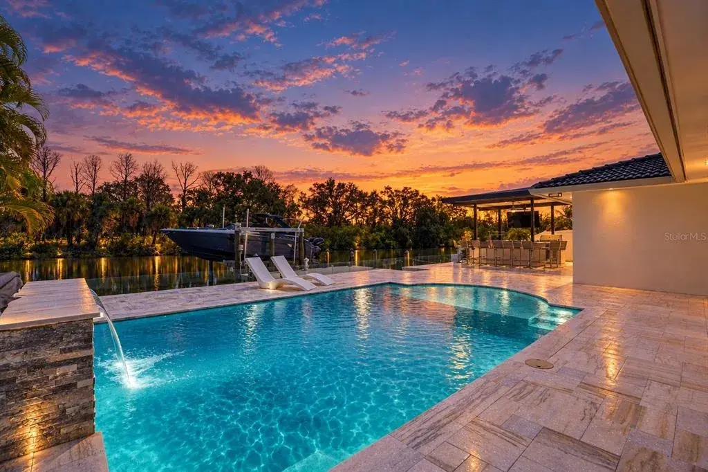 24000 lb boat lift, 18x28 dock, deep water canal with direct access to Tampa Bay with no rear neighbors