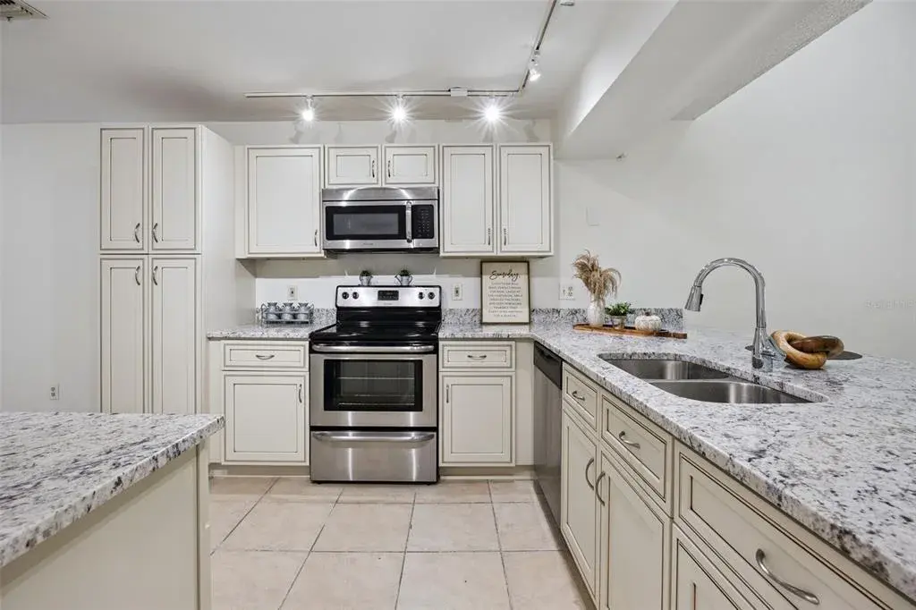 Newly Renovated Kitchen with granite countertops and cabinets
