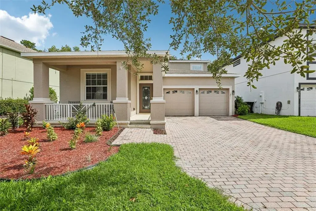 Set on a CONSERVATION LOT with peaceful WOODED VIEWS, this spacious two-story home offers 5 bedrooms, 3.5 baths, a desirable MAIN-FLOOR PRIMARY SUITE and a FULLY FENCED BACKYARD in the sought-after EAST PARK community of Lake Nona!