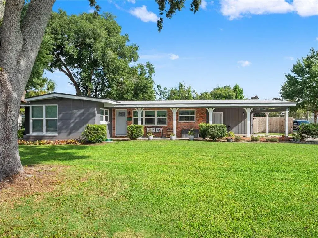 Covered front porch entry and huge corner lot.