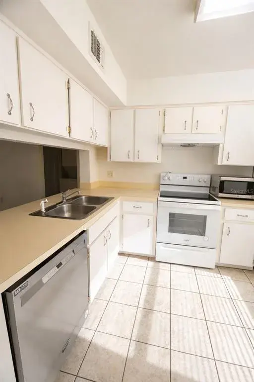 Property for sale at 3244 CANDLE RIDGE DRIVE UNIT 202, ORLANDO, FL, 32822
