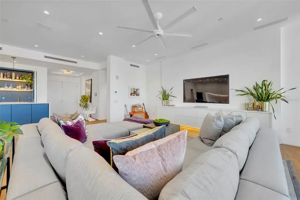 Living Room looking to foyer and bar area