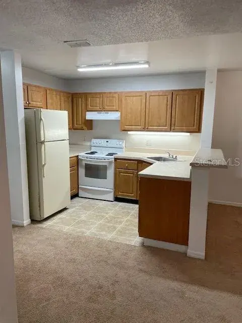 Property for sale at 6052 WESTGATE DRIVE UNIT 102, ORLANDO, FL, 32835