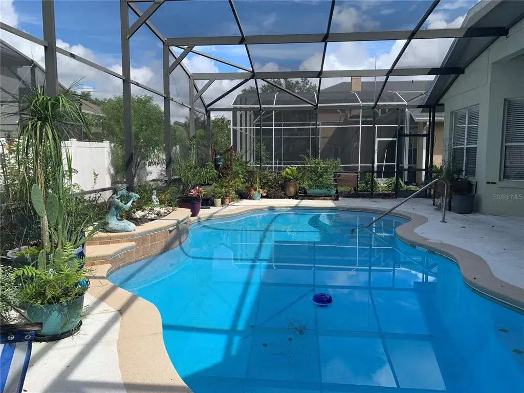 SCREENED AND SOLAR HEATED POOL