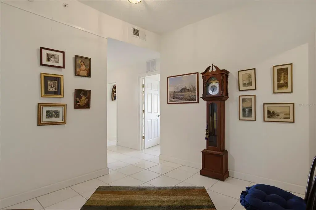 Foyer leads into a Open Concept floorplan with stunning Lake Views from all rooms