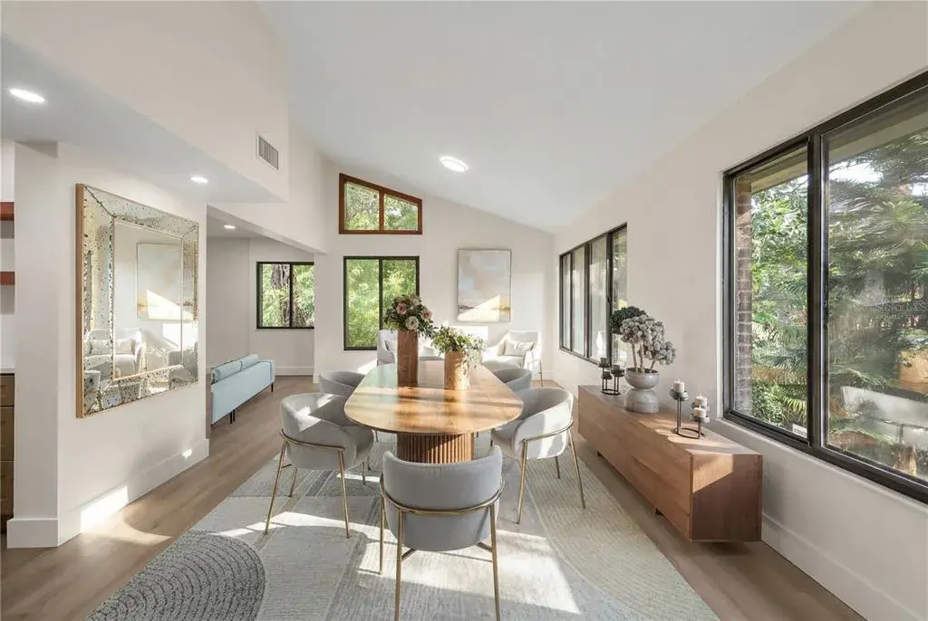virtually staged dining room and sitting area