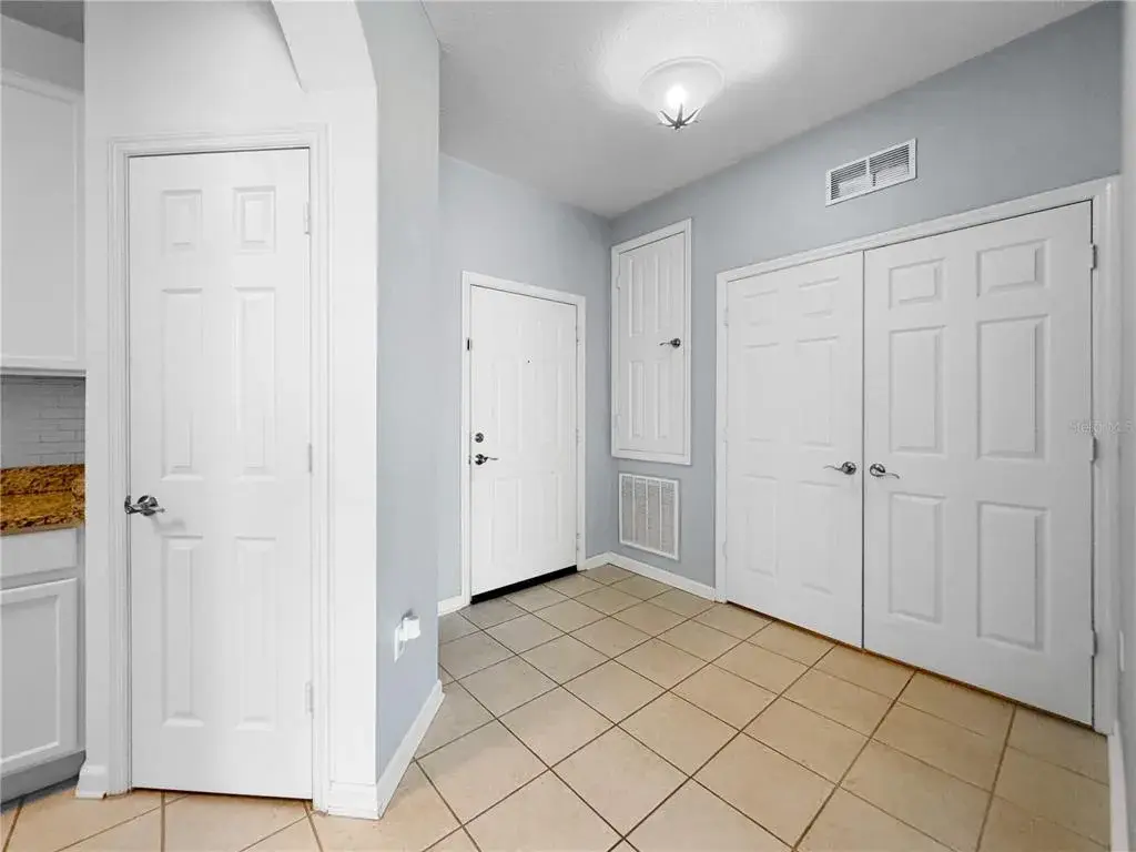 Foyer Entrance, AC Closet, Double doors are the Laundry room.